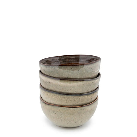 A stack of four gray ceramic bowls with a slightly speckled texture and a dark brown rim, crafted in the style of Portuguese ceramics, placed against a plain white background.