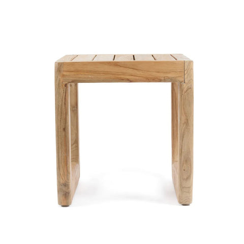 A small, simple wooden stool crafted from reclaimed teak wood with a natural finish, featuring a slatted rectangular top and solid, square legs—perfect as an outdoor side table or versatile stool.