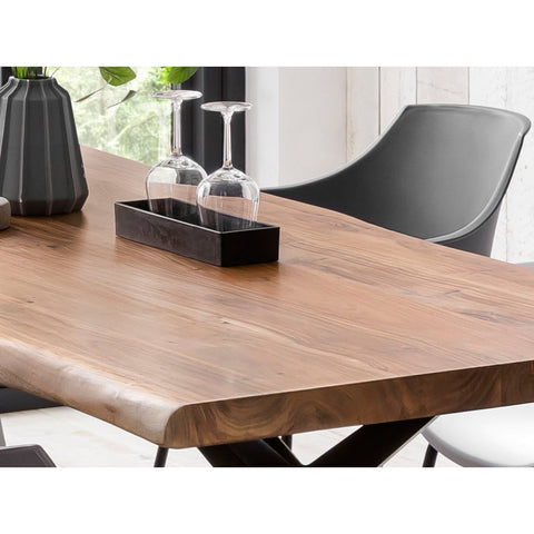 An Acacia Wood Table 160x85 cm featuring wine glasses and vases arranged on top.