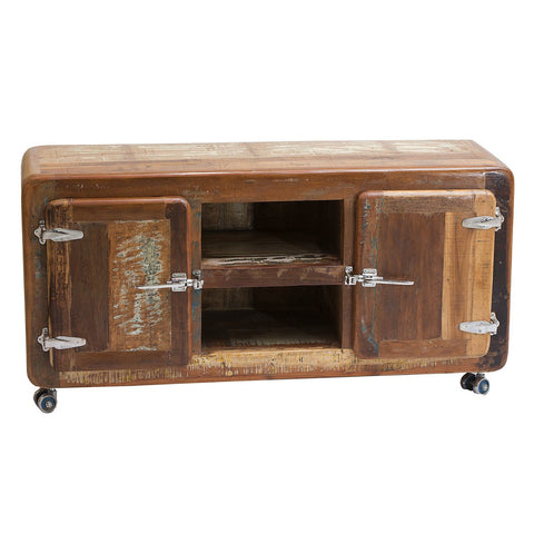 The Industrial Low Board Woodz is a rustic cabinet on small wheels, with two hinged doors, metal latches, and an open middle shelf. Its distressed wood finish adds vintage charm to any space.