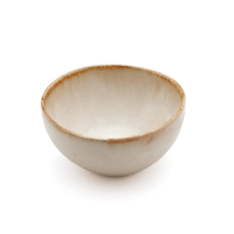 A simple, round ceramic bowl with a smooth, off-white glaze and a slightly darker brown rim, this piece of handmade tableware showcases the timeless elegance of Portuguese ceramics on a white background.