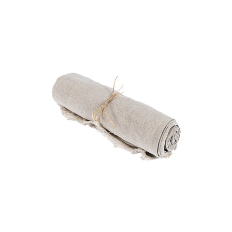 The Linen Tablecloth - Beige - 150x250, made from 100% linen, is rolled up and tied with a simple string, set against a white background.