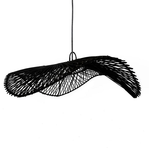 The Chapeau Pendant - Black - L is a modern rattan light with an abstract wavy design, crafted from woven material, hanging from a single cord against a plain white background.