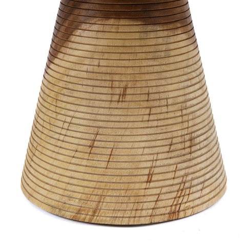 Wooden base of side table with a textured surface on a white background