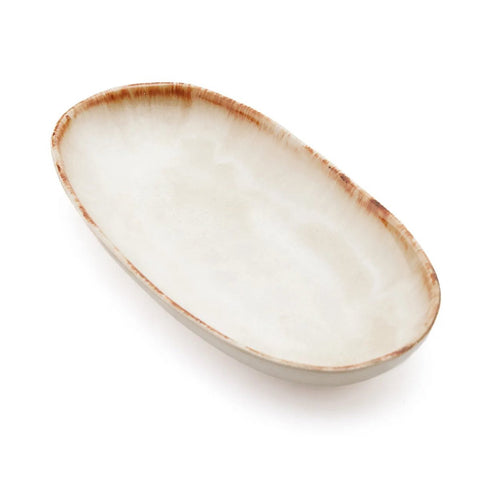 An oval-shaped ceramic plate with a slightly uneven rim and a brown, rustic edge on a white background. The chip-proof plate features a smooth, off-white surface, showcasing the quality of handmade tableware.