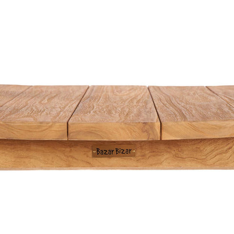 Wooden surface with 'Bazar Bizar' branding on a white background