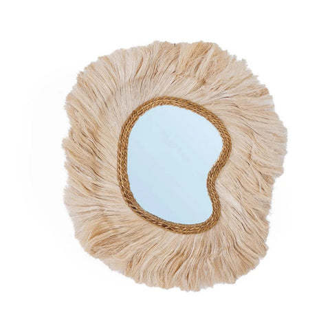 Round mirror with raffia fringes on a white background