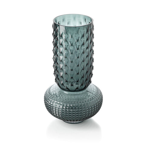Textured glass vase on a white background
