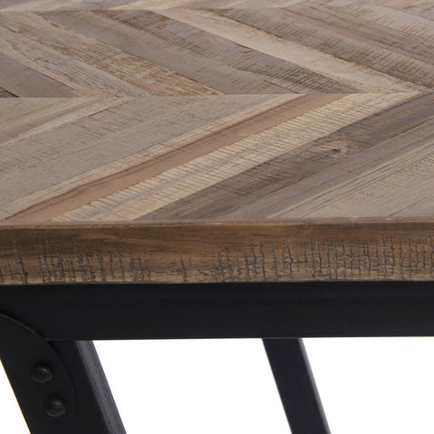 Wooden table top with a herringbone pattern and metal legs on a white background