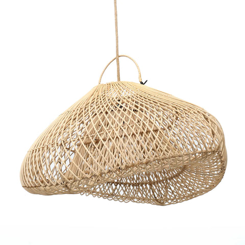 A handcrafted rattan pendant light with an asymmetrical, organic shape hangs from a thin cord. Its intricate lattice design allows light to filter through, crafting a warm and natural boho ambiance.