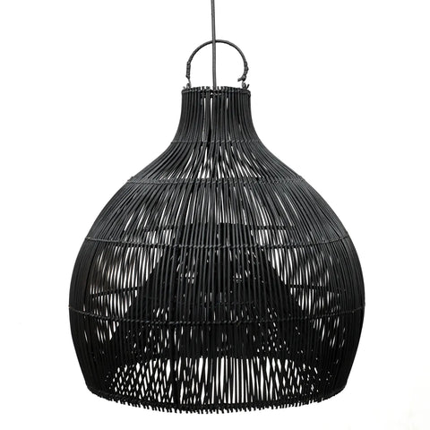 A black, woven rattan pendant light with a spherical, open-weave design hangs gracefully from a cord. The lamp features a slightly tapered top, embodying a modern and stylish appearance reminiscent of a coastal lamp vibe.