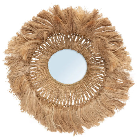 A round, handcrafted abaca grass mirror featuring a decorative frame made of woven natural fibers and fringed edges. The sunburst design gives it a rustic, organic appearance, making this eco-friendly mirror a striking addition to any space.