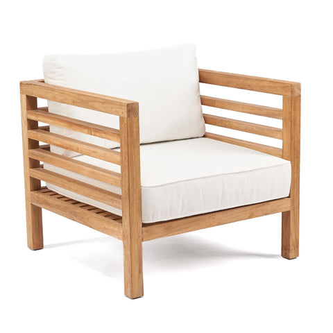 Part of the Moyo Collection, this wooden armchair boasts a minimalist design with a slatted frame and white cushioned seat. Crafted from reclaimed teak wood, its natural finish offers a modern, clean look perfect for modular outdoor seating arrangements.