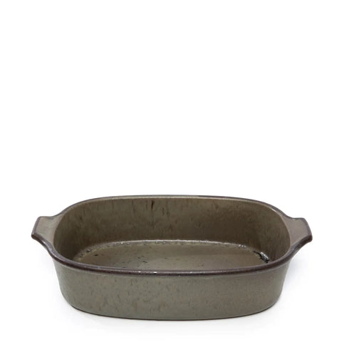 A rectangular, greyish green oven tray from the Comporta Collection features slightly curved sides and small handles at each end. The speckled glaze adds texture, making it a beautiful focal point against a plain white background.