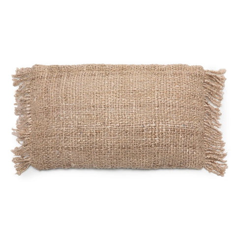 A rectangular burlap pillow with frayed edges on each corner exudes a boho vibe. Its natural, textured appearance showcases the woven fibers of the burlap material, blending seamlessly with eclectic decor.