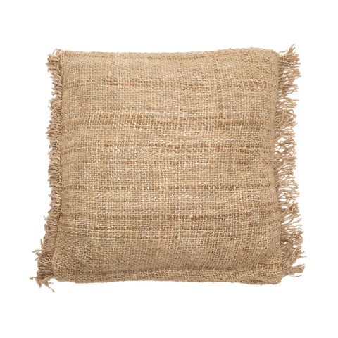 A square, textured burlap pillow with frayed edges, made from hand-dyed, rough woven fabric in a natural, light brown color, perfectly capturing that boho vibe.