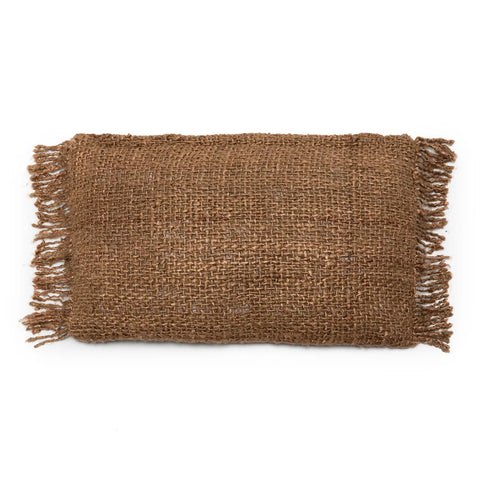 A rectangular brown burlap pillow with fringed edges is displayed on a white background. The textured fabric offers a handmade textile feel, enhancing its rustic appearance with a subtle boho vibe.