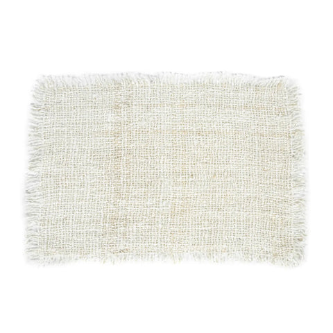 A rectangular beige woven rug with a luxurious texture and fringed edges exudes elegance. Its soft surface makes it an ideal dining table decoration, enhancing any setting against a plain white backdrop.