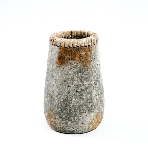 Textured, stone-like vase in earthy brown tones, featuring a woven rope detail around the rim. Perfect as a dry flowers vase, it stands gracefully against a plain white background.