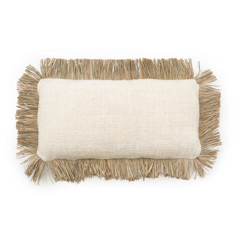 A rectangular beige pillow with a textured fabric, featuring boho touch raffia fringed edges made of natural fibers. The fringe creates a rustic and cozy appearance, perfect for soft furnishings.