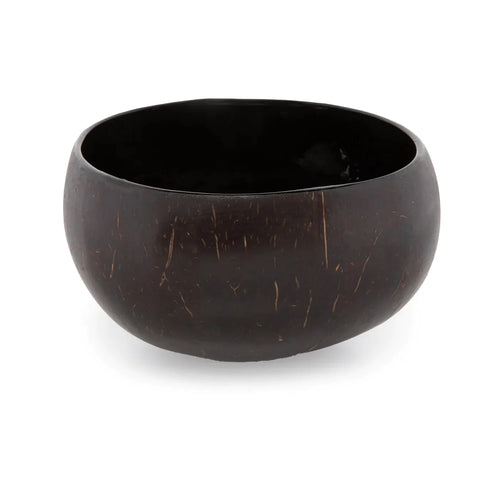 A rounded, dark brown coconut shell bowl with a smooth interior surface on a white background is the ultimate foodie must-have. These versatile coconut bowls are perfect for enhancing your culinary presentations or serving as stylish, eco-friendly multipurpose bowls.