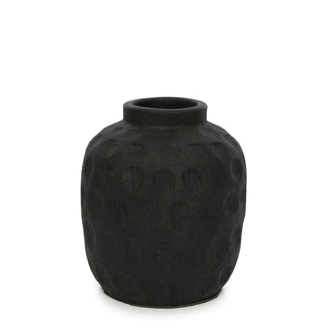 A black, ribbed ceramic vase with a rounded shape and narrow opening, perfect for showcasing dried flowers against a plain white background.