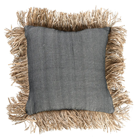 A square gray pillow with a woven texture and raffia fringes on all sides, resembling straw. This cotton cushion is centered against a white background, exuding a coastal design vibe.