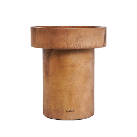 A timeless piece, this wooden cylindrical table boasts a wide, thick top with a seamless design that highlights the natural wood grain and smooth finish. Ideal as an indoor or covered outdoor table, it offers a minimalist and modern aesthetic perfect for any space.