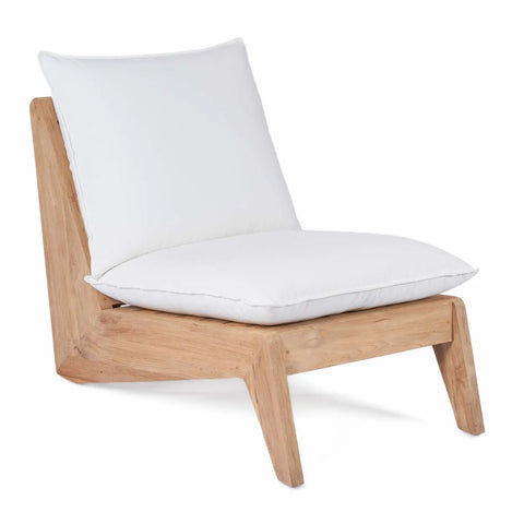 A modern lounge chair crafted from reclaimed teak wood features a light frame and two white, cushioned seats. With its low-profile design and slightly reclined backrest, this lazy one-seater sofa perfectly complements any space.