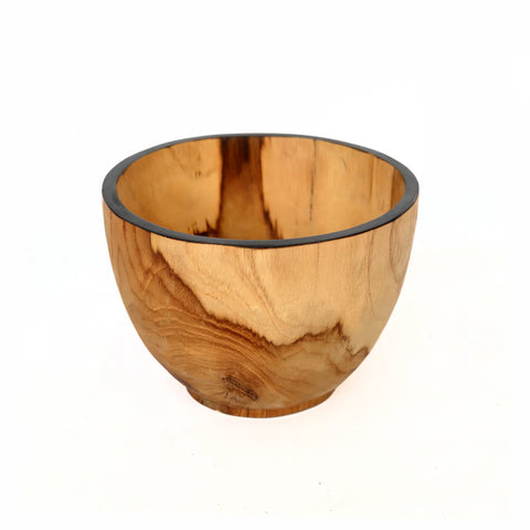 A teak wood bowl with a smooth, polished surface and natural grain patterns. The rounded shape and slightly flared rim showcase a warm, earthy hue, making it a perfect multifunctional interior accessory.