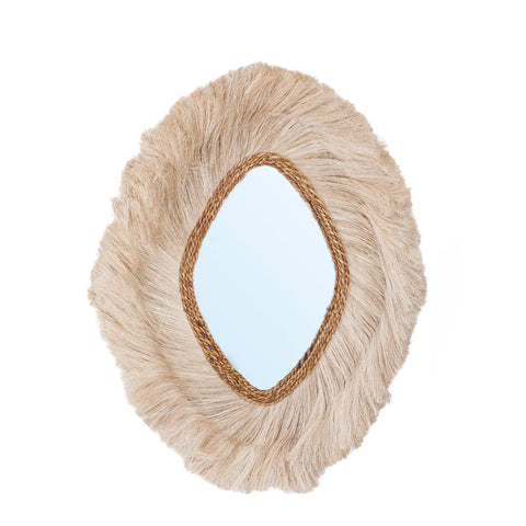 The Duchessa mirror is an oval masterpiece, boasting a classic design with a luxurious delicate frame. Beige, fur-like material radiates outward like petals or a mane, encasing the glass in elegance, while a braided rope border adds the perfect finishing touch.