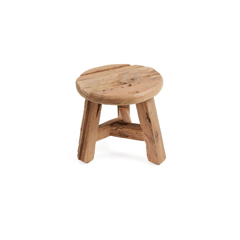 A small, rustic Yatai stool crafted from upcycled teak wood, with three legs and a round seat, stands elegantly on a white background.