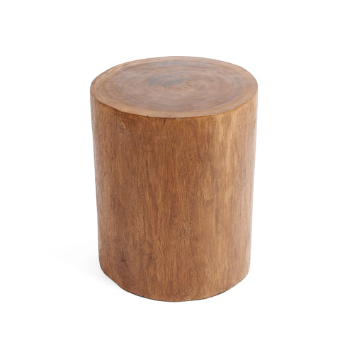 A handmade stool crafted from Mungurr wood features a wooden cylindrical shape with a natural finish, showcasing visible wood grain patterns. Its simple design highlights the organic texture and warm brown color of the material, enhancing its natural and organic appeal.