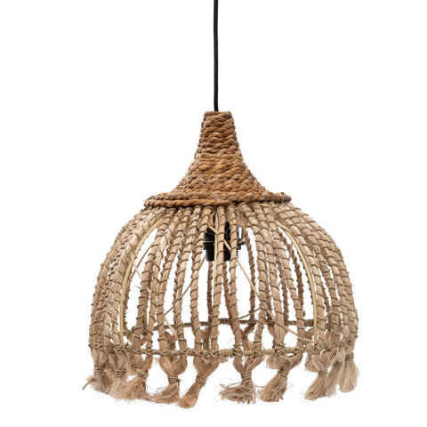 A hanging pendant light fixture with a woven, natural fiber design resembling an upside-down basket. Crafted from Abaca Grass, its earthy tones and boho vibe exude a rustic, bohemian feel, while loose, dangling tassels adorn the bottom edge for an added touch of whimsy.