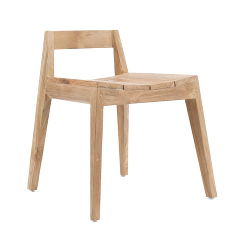 A minimalist dining chair made from eco-friendly reclaimed teak, featuring a natural finish with a flat seat and low, rectangular backrest. The design includes four slightly angled legs, creating a modern, geometric look against a plain white background.