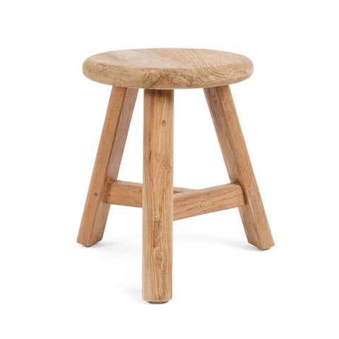 A simple, round wooden stool with three legs and a rustic finish, crafted from reclaimed teak wood.