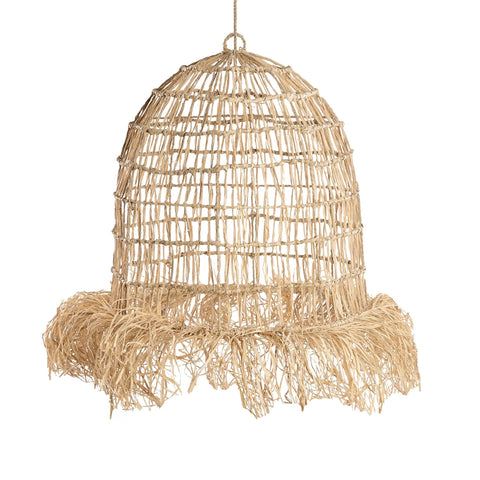 A large, dome-shaped lampshade made of woven mendong grass hangs from a cord. The bottom edge is fringed, giving it a rustic, handcrafted appearance reminiscent of a casita pendant in a tropical paradise.