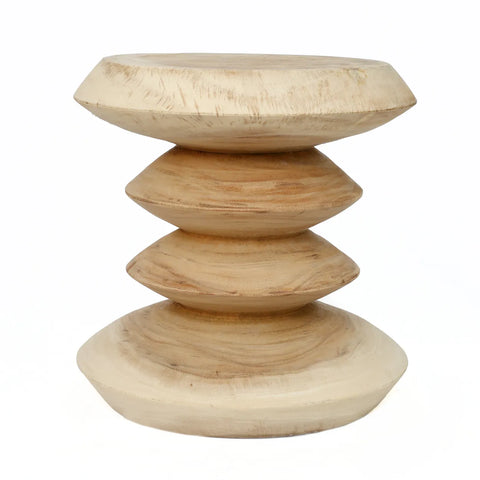 A teak wood, wooden stool with a unique, sculptural design, featuring four rounded, disc-like tiers stacked vertically. The stool has a natural summer vibe with its wood finish and smooth surface.