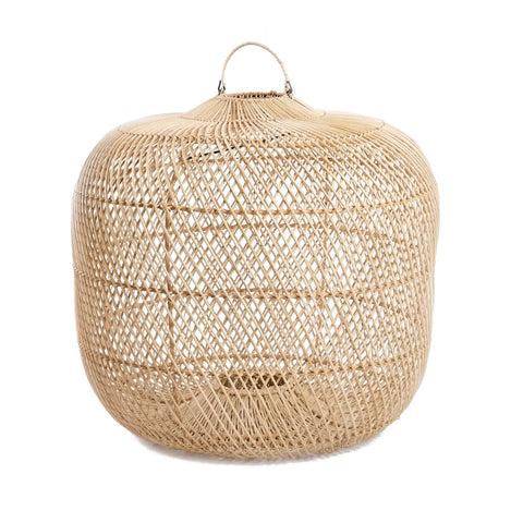 A woven rattan basket with a rounded shape and a lid features an intricate lattice design reminiscent of a rattan lamp shade. A small handle is on top, and the basket's light, natural color lends it a rustic appearance.