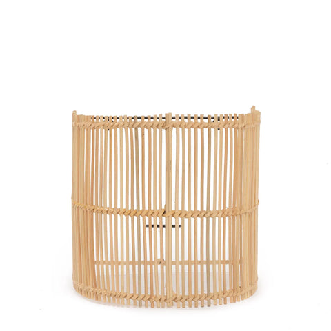 A cylindrical bamboo basket with an open, woven design sits on a plain white background. The basket's vertical slats and rattan accents create a natural, airy appearance, echoing the delicate craftsmanship often found in wall appliques.