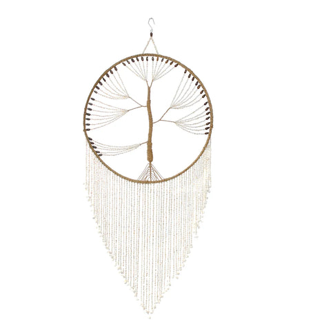 A handmade dream catcher features a tree design in the center, its circular hoop artfully wrapped in string. Long strands of white beads hang gracefully from the bottom, creating a triangle shape, perfect for adding a touch of bohemian charm to any space.