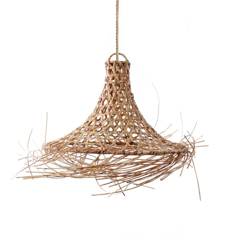 A handcrafted rattan pendant lamp hangs from a single cord, showcasing a flared, bell-shaped design. Its loosely woven fringes around the bottom edge exude a rustic and natural charm, perfect for infusing any space with a coastal boho vibe.