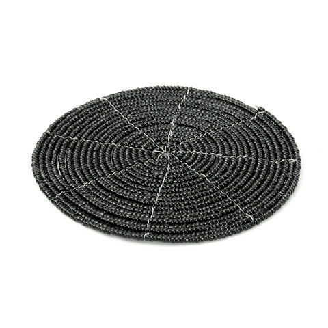 This round black beaded placemat features a textured, spiral design that perfectly embodies the Boho Chic style.