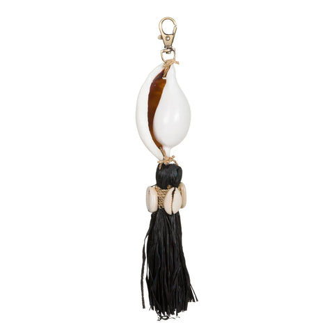 Discover a boho luxury keychain featuring a large cowrie shell, smaller shells, and black seashell tassels. This unique accessory includes a gold-tone clip for easy attachment.