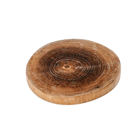 A circular wooden coaster with a natural look, featuring visible rings and a smooth, polished surface. The warm brown tone and rustic appearance evoke boho chic vibes, perfectly highlighting the tree's growth rings.