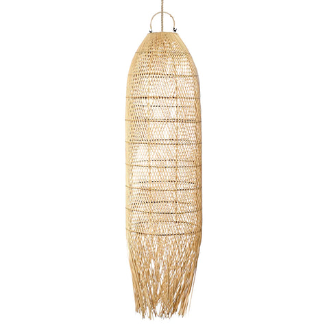 A tall, cylindrical boho lamp made from natural fibers, featuring intricate patterns and a fringe at the bottom. This rattan lamp hangs from a simple cord, adding a rustic and bohemian touch to the decor.