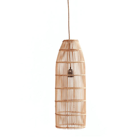 A tall, cylindrical rattan pendant light hangs from the ceiling in the living room. This boho lamp features an open-weave design, allowing light to shine through the natural material, creating a warm and inviting ambiance.