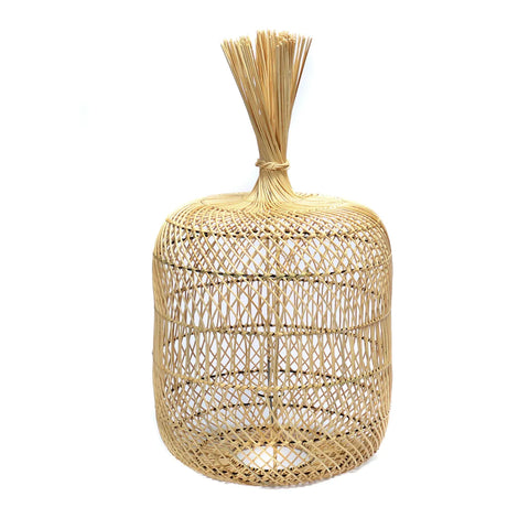 A decorative rattan basket, with an open weave design and narrow top reminiscent of bundled straw, offers an intricately crafted, boho charm. Its natural fibers and texture embody the essence of a multi-purpose lamp or boho decor piece.