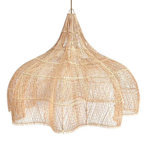 A large, intricately woven rattan light fixture embodies boho chic style as it hangs gracefully from a cord. Its organic, dome-like shape with flowing curves renders an elegant and airy appearance, allowing light to filter beautifully through the lattice design of this XXL pendant lamp.