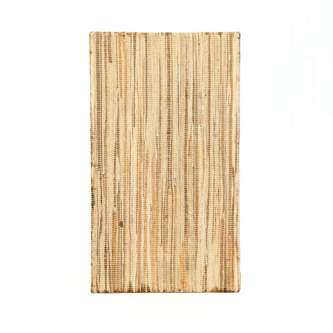 A rectangular wooden cutting board with a vertical striped grain pattern exudes a subtle boho vibe, set against a crisp white background.